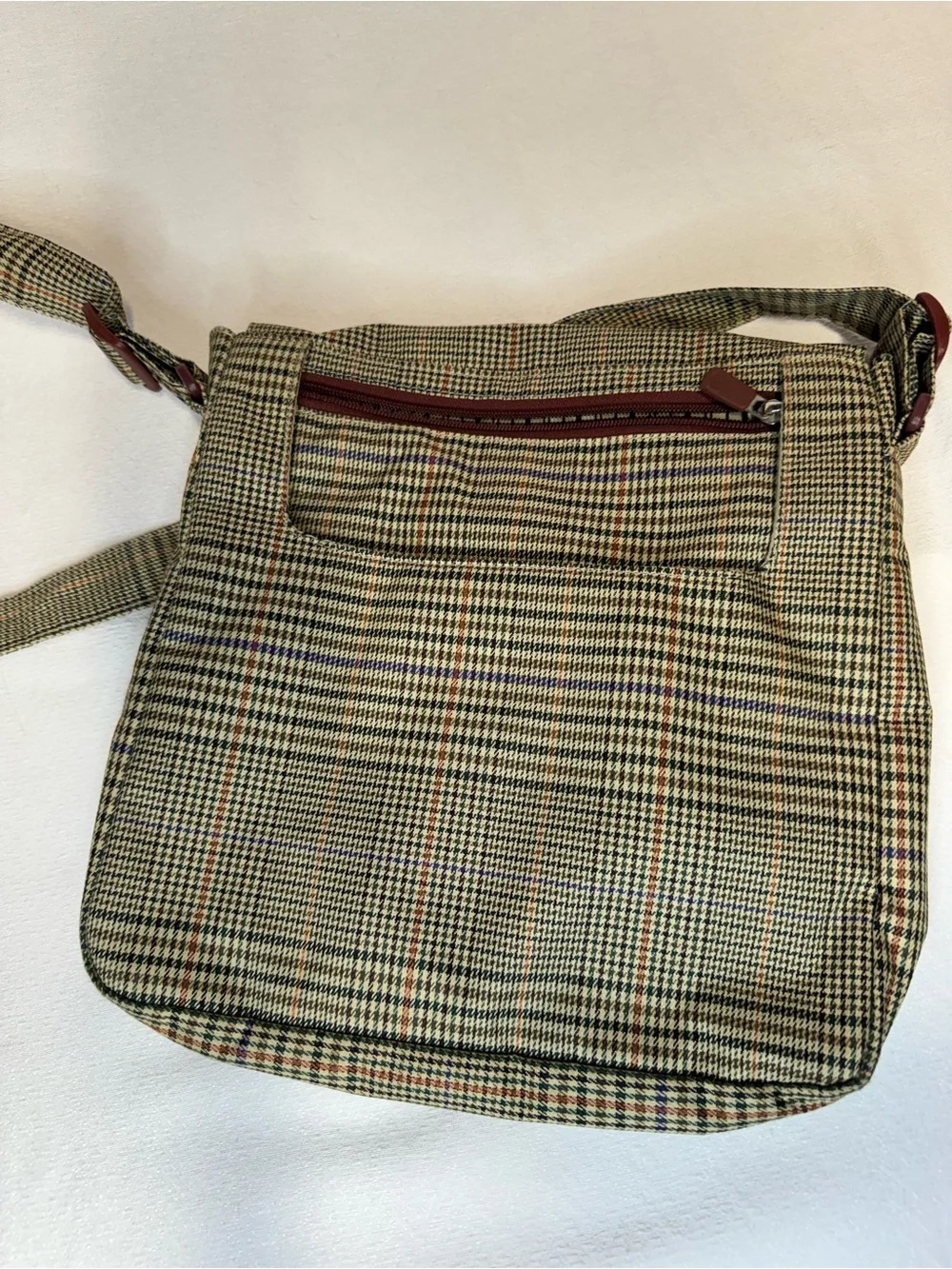 The North Face compact messenger